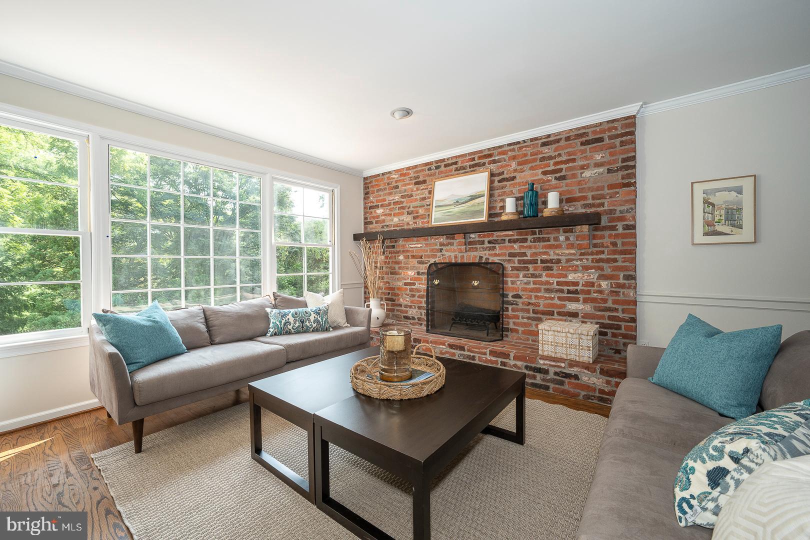 1117 Ivymont Road Bryn Mawr, PA 19010 - Photo 13 of 57 Brick fireplace is the focal point