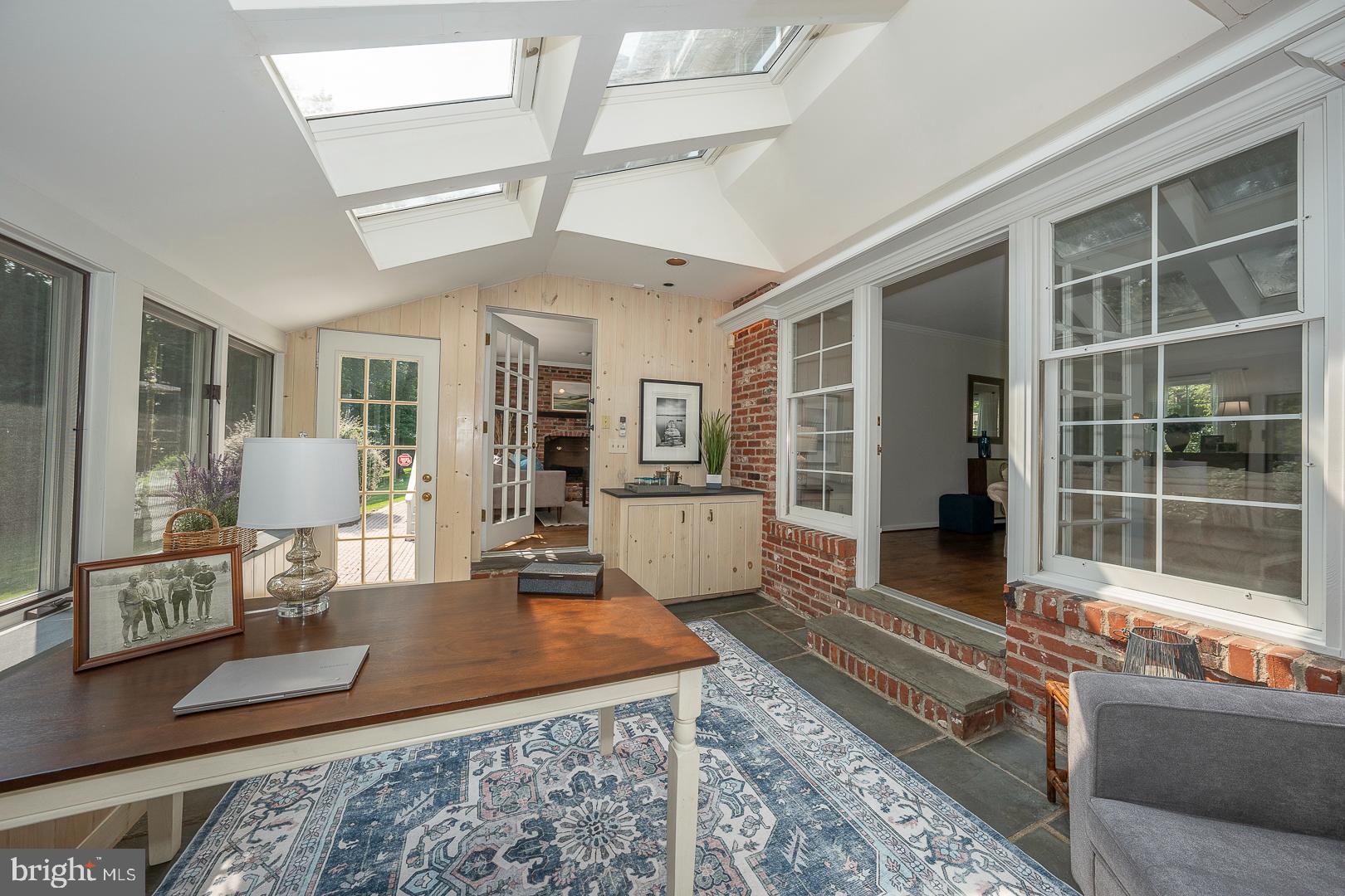 1117 Ivymont Road Bryn Mawr, PA 19010 - Photo 10 of 57 This three seasons room flows from the LR and FR