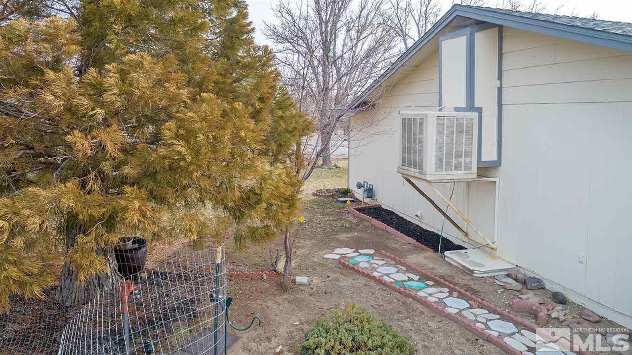 304 River Boat Road Dayton, NV 89403 - Photo 20 of 20 a front view of a house with a yard