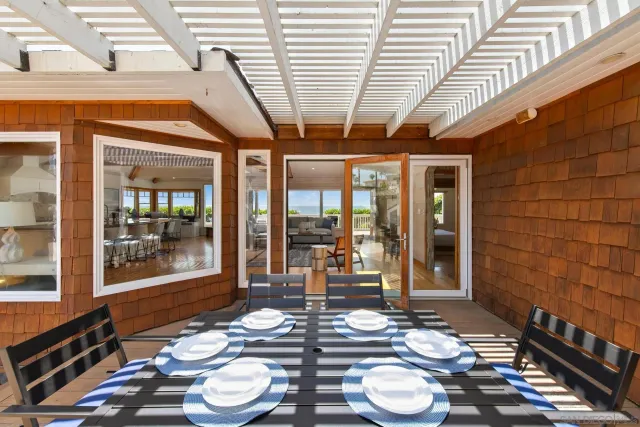 a patio with patio table and chairs