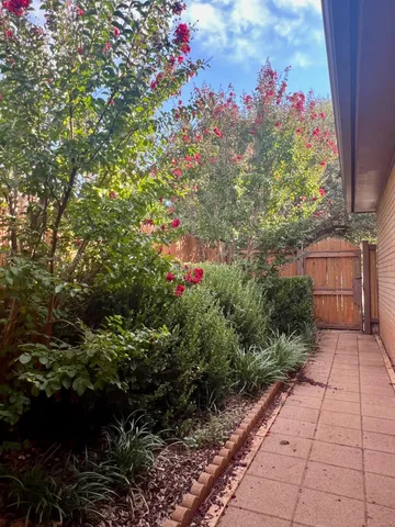 a view of a porch and a yard