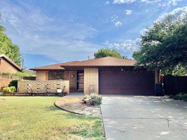a view of a room with racks and has white walls