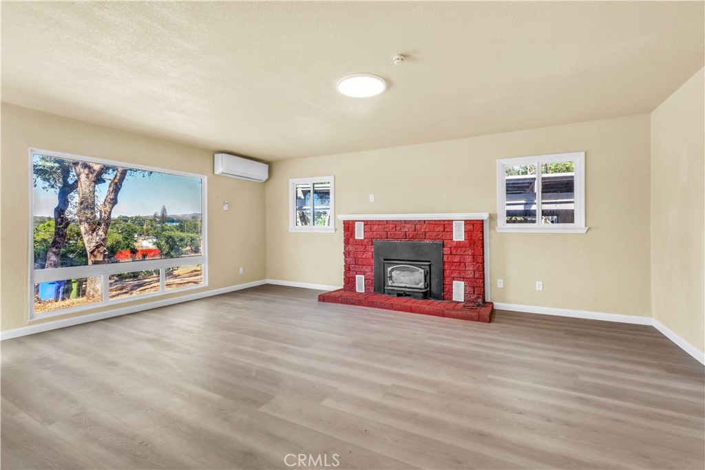 15905 Kugelman Street Lower Lake, CA 95457 - Photo 66 of 75 an empty room with furniture and a fireplace