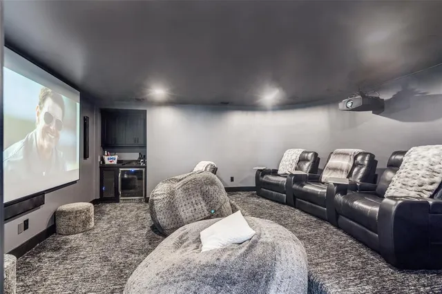 a large bathroom with a tub a sink a mirror and a shower