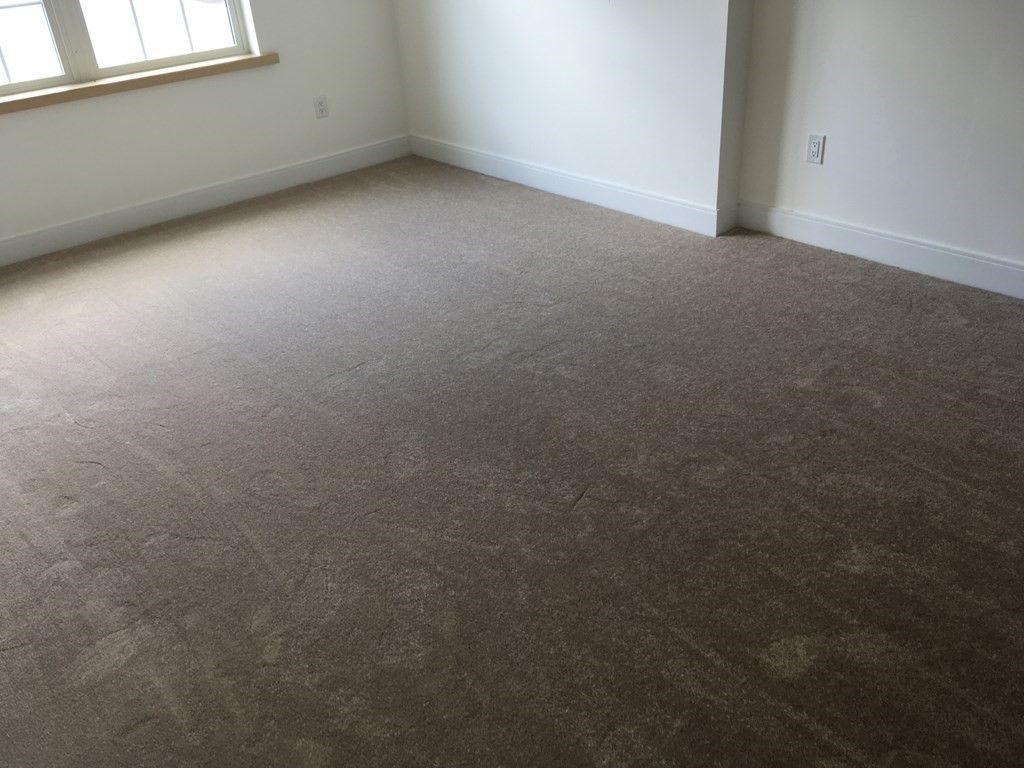 2239 Washington Street, Unit 200 Canton, MA 02021 - Photo 15 of 35 a view of an empty room with a window