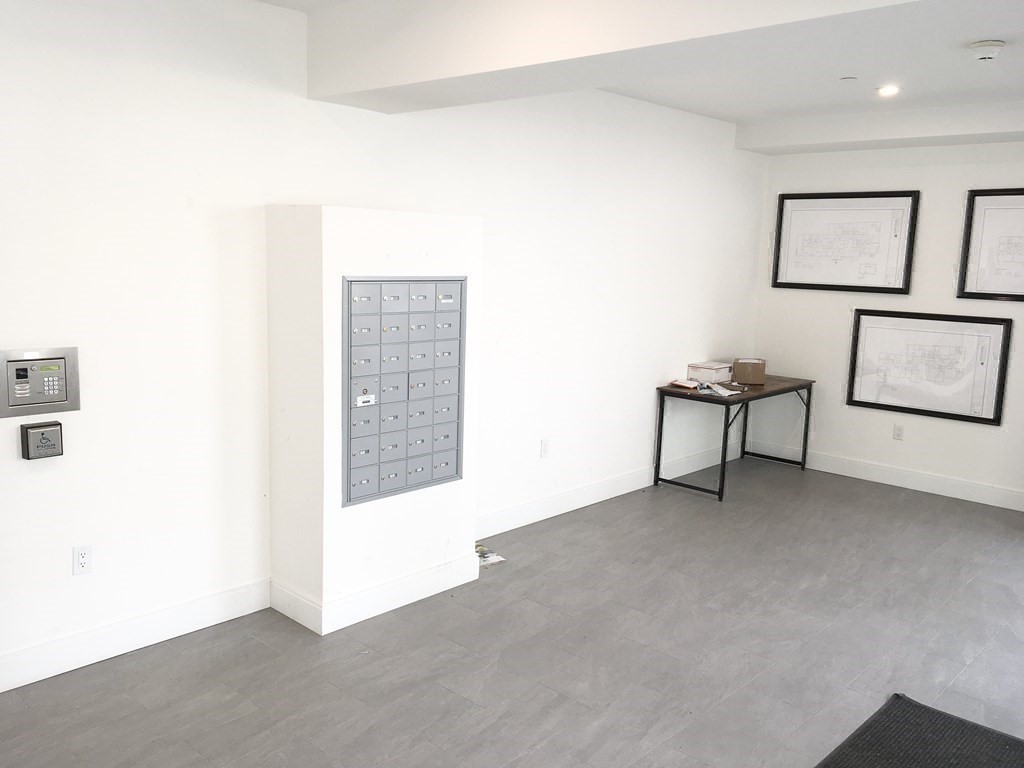 2239 Washington Street, Unit 200 Canton, MA 02021 - Photo 30 of 35 a view of an empty room with furniture