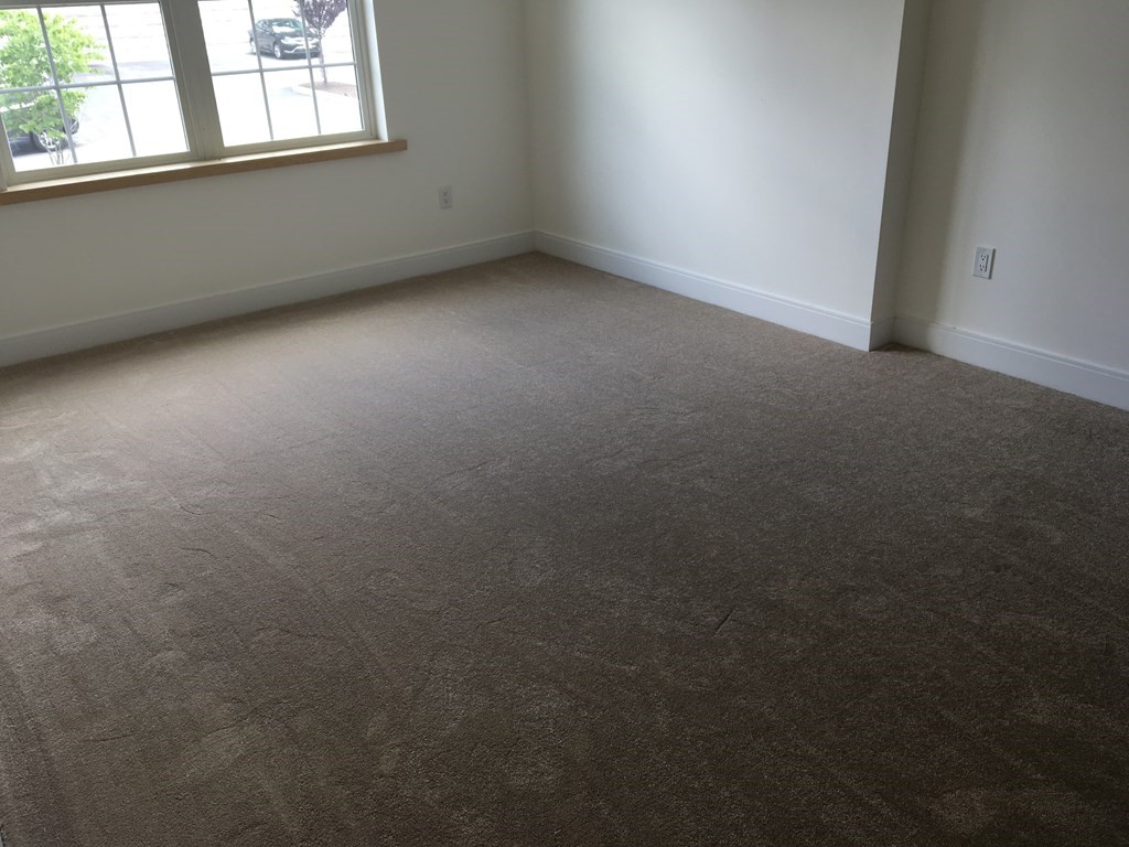 2239 Washington Street, Unit 200 Canton, MA 02021 - Photo 35 of 35 an empty room with a window