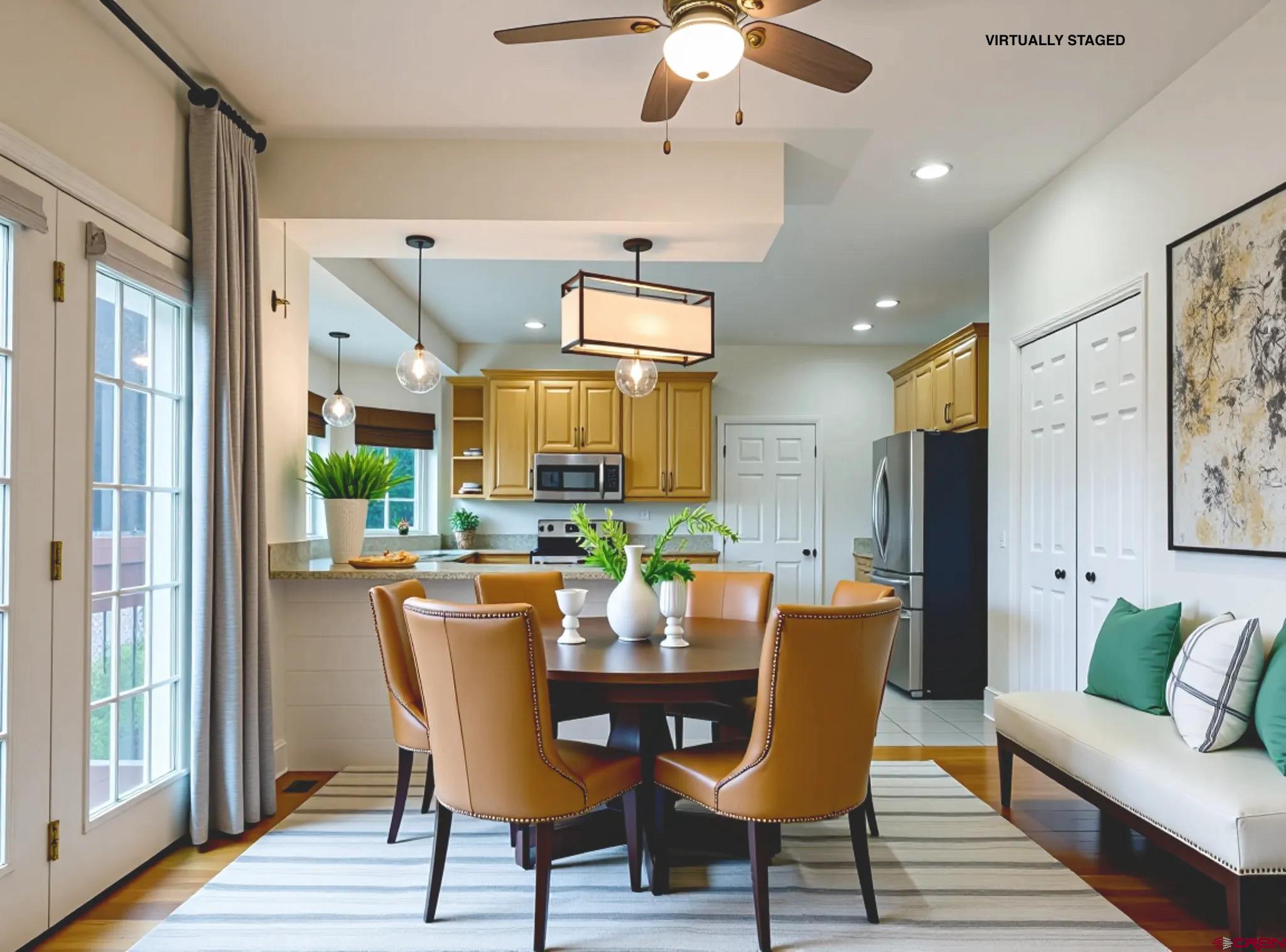 1484 1600th Road Delta, CO 81416 - Photo 16 of 45 a view of a dining room with furniture window and wooden floor
