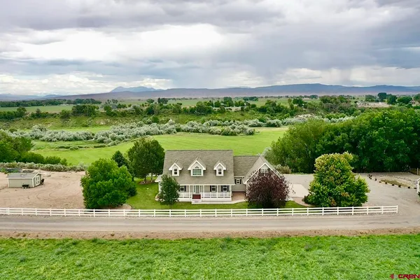 a view of a golf course with on deck