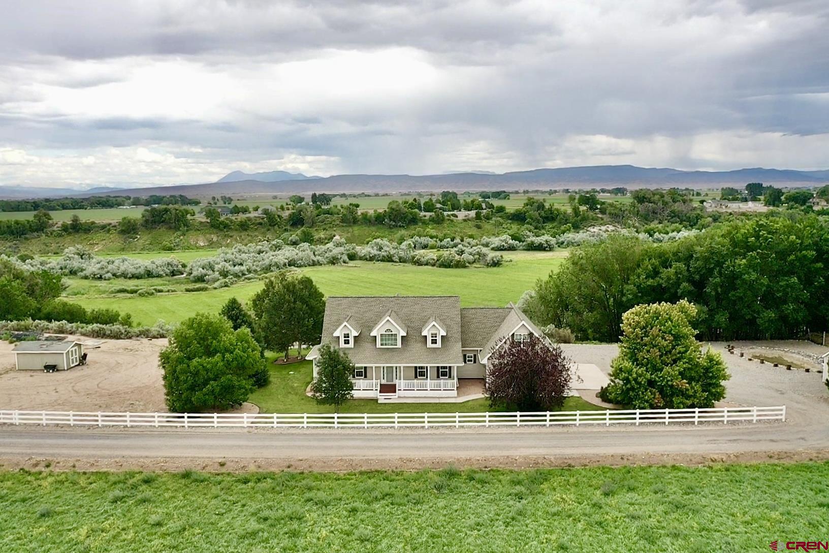 1484 1600th Road Delta, CO 81416 - Photo 2 of 45 a view of a golf course with on deck