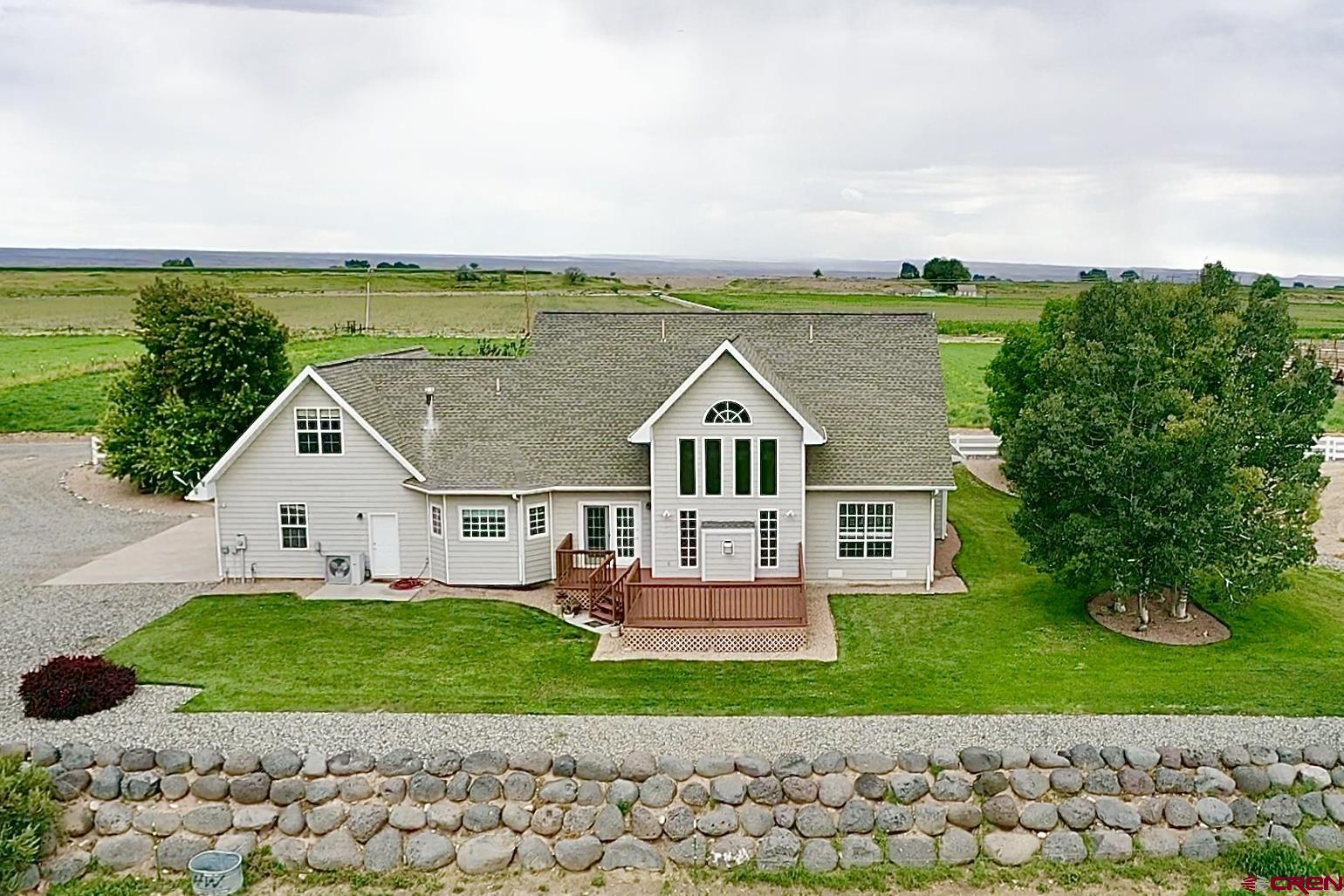 1484 1600th Road Delta, CO 81416 - Photo 4 of 45 a view of house with garden space and street view