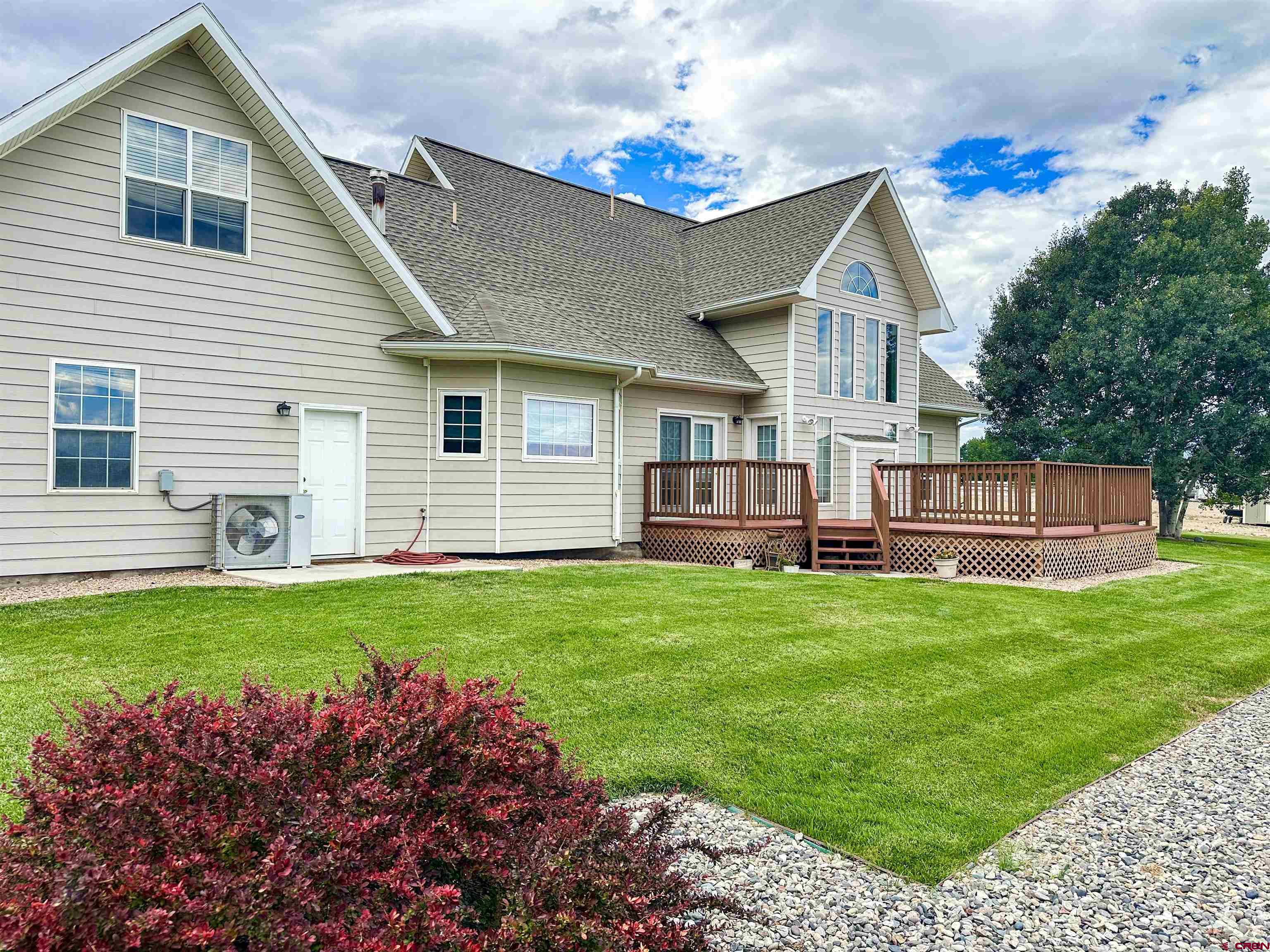 1484 1600th Road Delta, CO 81416 - Photo 41 of 45 a front view of a house with a yard