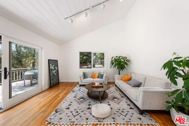 a view of balcony with furniture