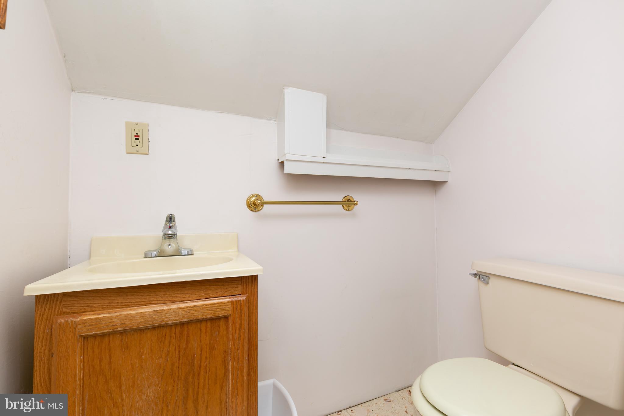 22 South Fellowship Road Maple Shade, NJ 08052 - Photo 14 of 19 a bathroom with a sink a toilet and mirror