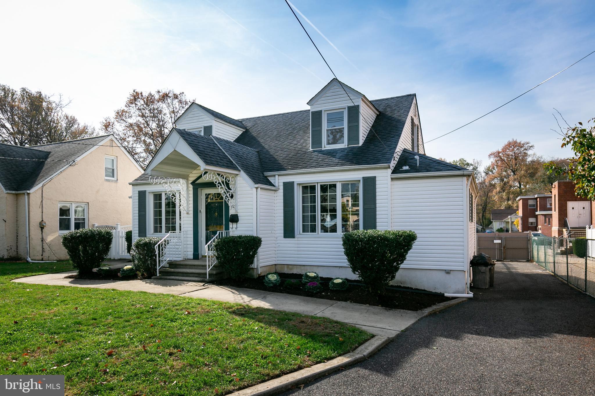 22 South Fellowship Road Maple Shade, NJ 08052 - Photo 3 of 19 a front view of a house with garden