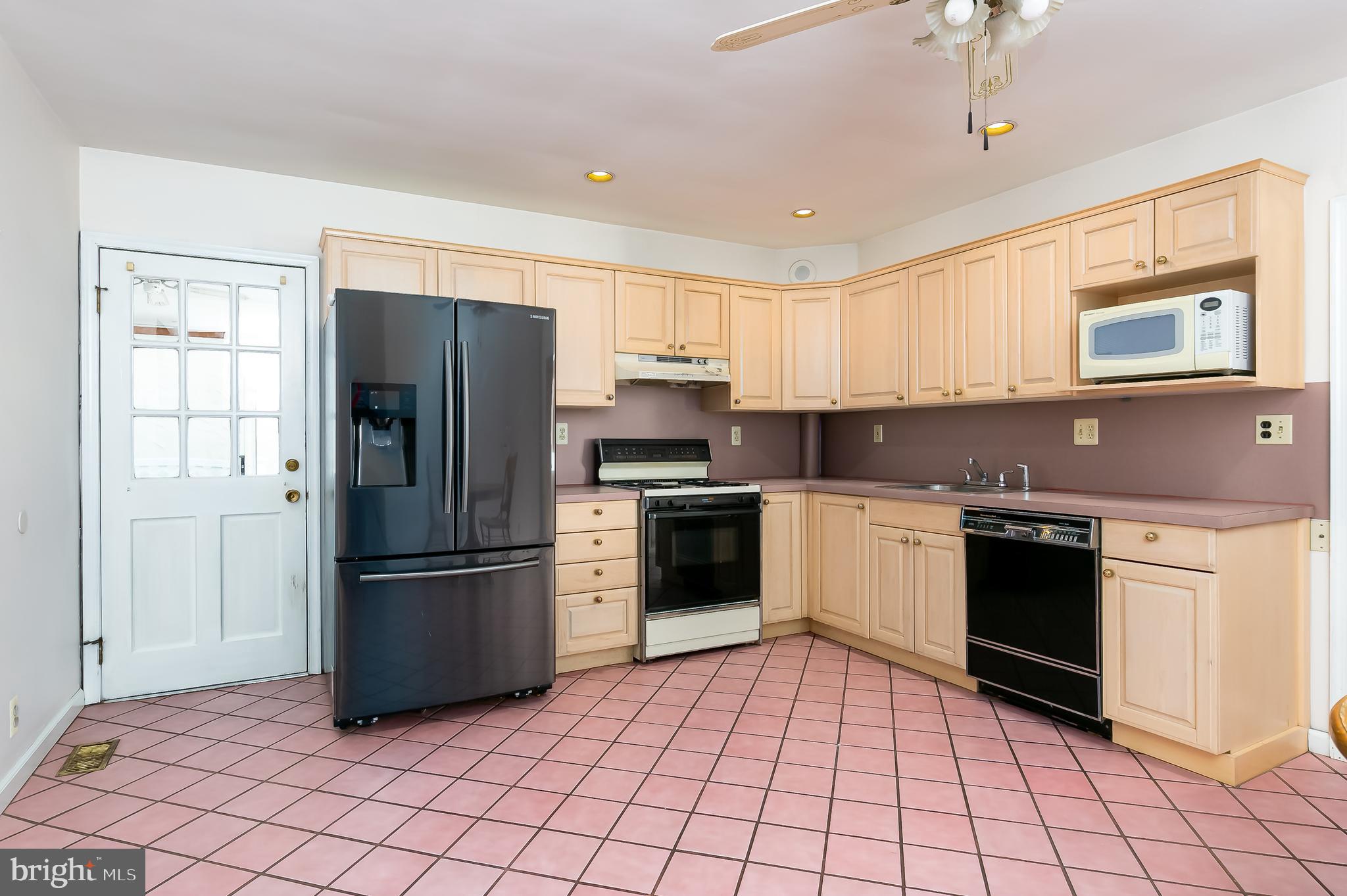 22 South Fellowship Road Maple Shade, NJ 08052 - Photo 5 of 19 a kitchen with stainless steel appliances granite countertop a refrigerator and a stove top oven