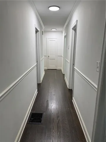 a view of entryway with wooden floor