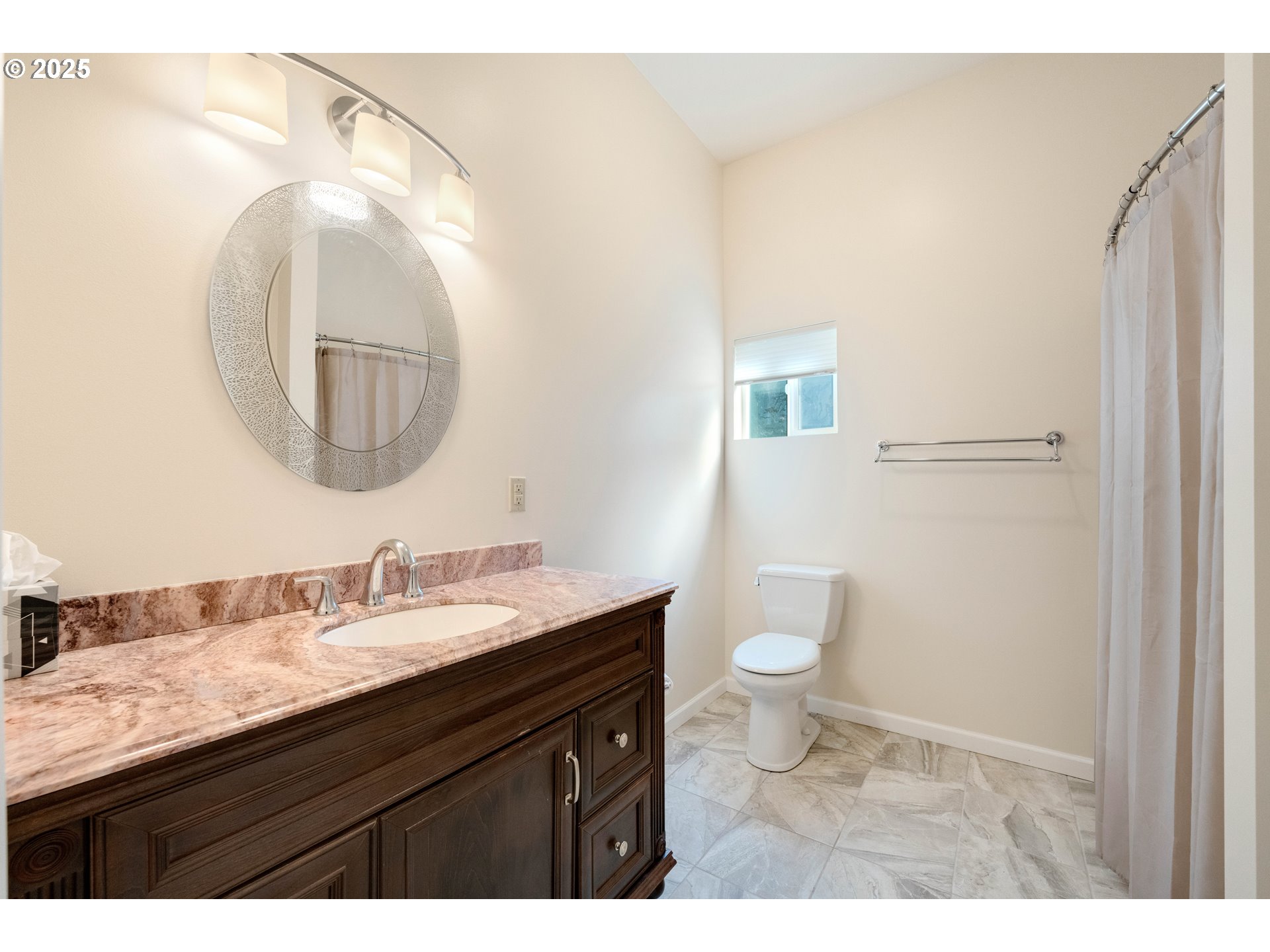 55654 Prosper Jct Road Bandon, OR 97411 - Photo 46 of 48 a bathroom with a granite countertop sink toilet and a mirror