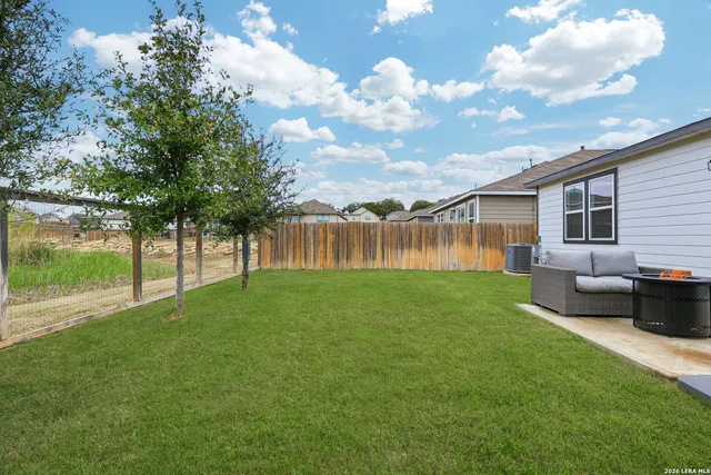 a view of a backyard with a garden