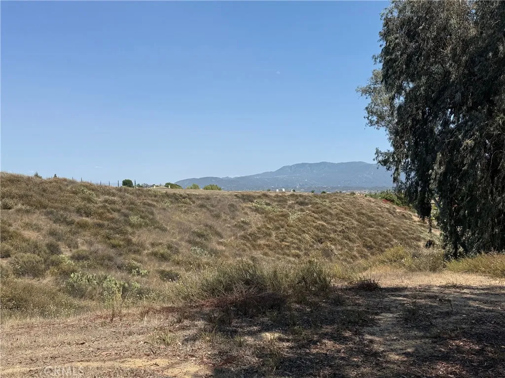 0 Paulita Road Temecula, CA 92592 - Photo 18 of 36 a view of a dry yard with mountains in the background