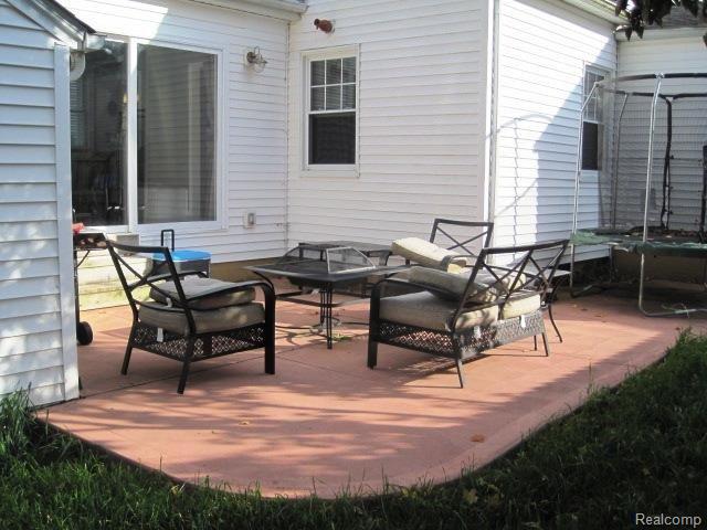 504 Maple Street Howell, MI 48843 - Photo 9 of 52 Back Patio II.jpg