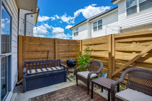 a view of a chairs in back of the balcony