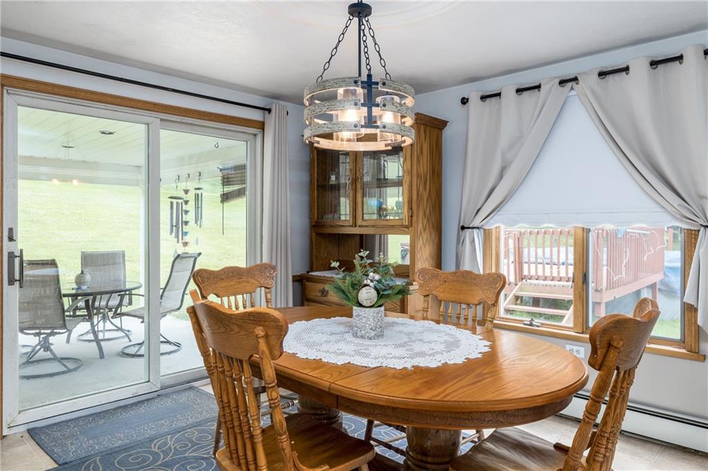 Cozy dining area opens to back patio.