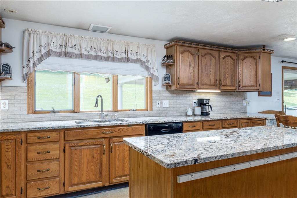 224 Vance Station Road Washington, PA 15301 - Photo 8 of 38 Undermount sink with newer granite counters.
