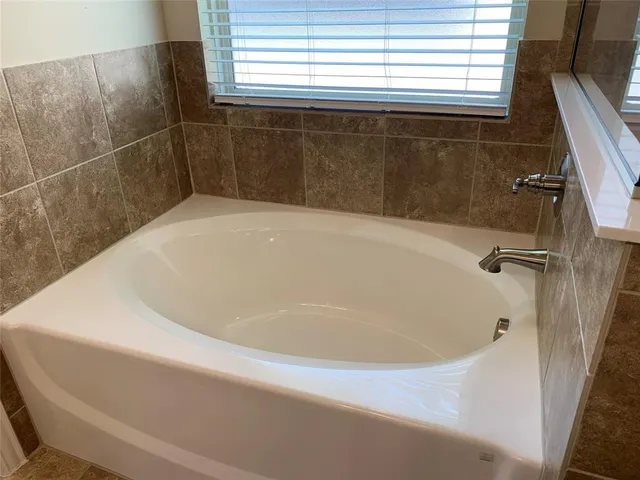 a bathroom with a bathtub