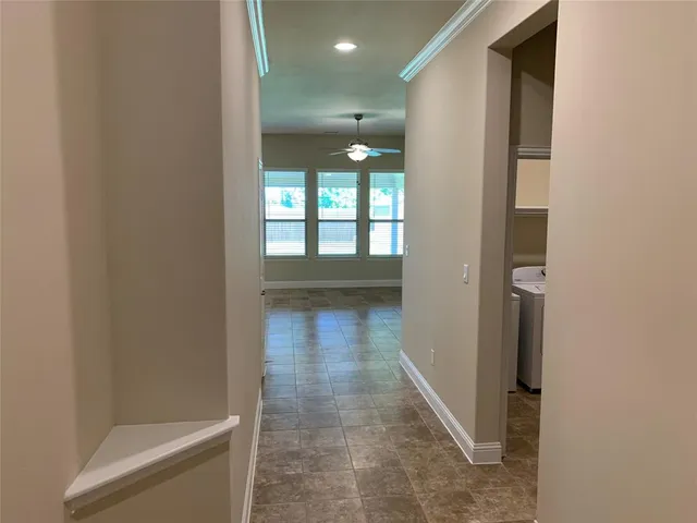 a bathroom with a shower and a toilet