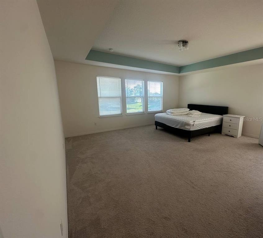 3877 Mount Vernon Way Kissimmee, FL 34741 - Photo 19 of 27 a view of livingroom with furniture and window