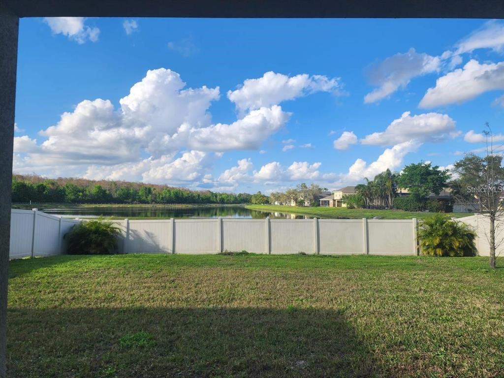 3877 Mount Vernon Way Kissimmee, FL 34741 - Photo 25 of 27 a view of lake with green yard