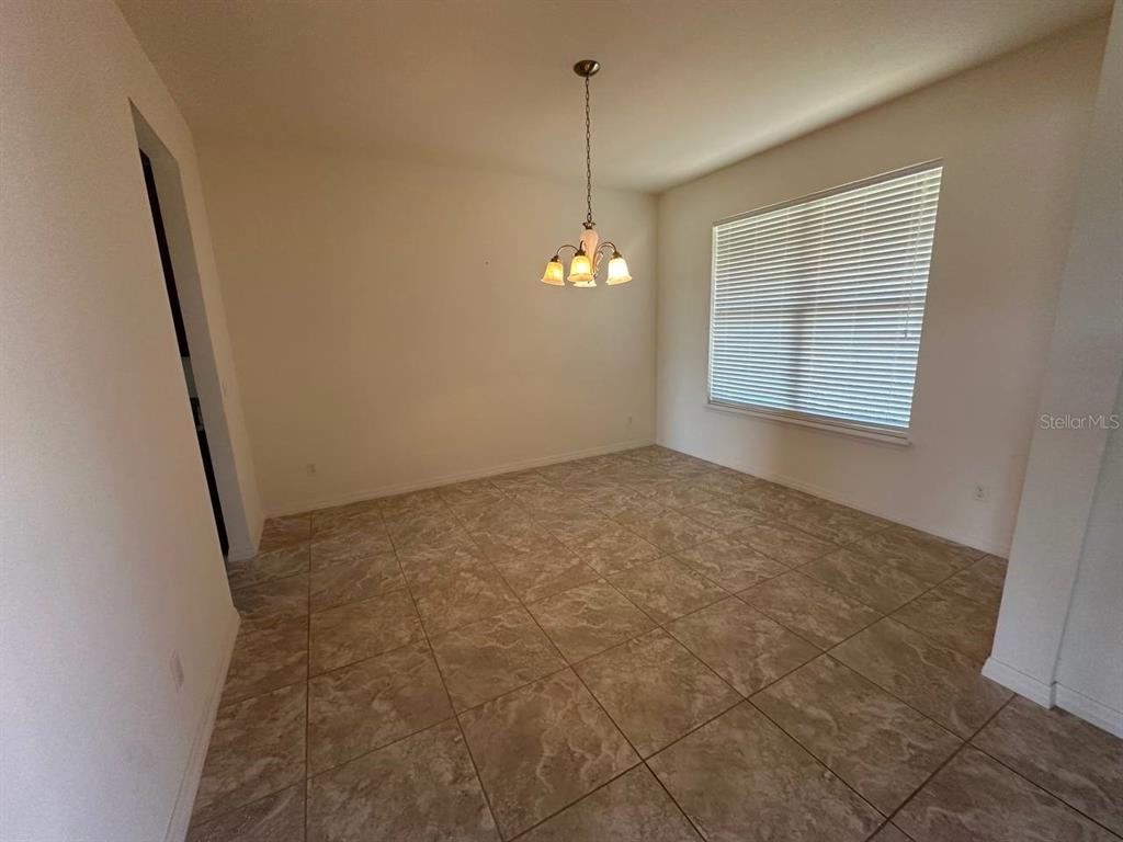 3877 Mount Vernon Way Kissimmee, FL 34741 - Photo 4 of 27 a view of a room with windows