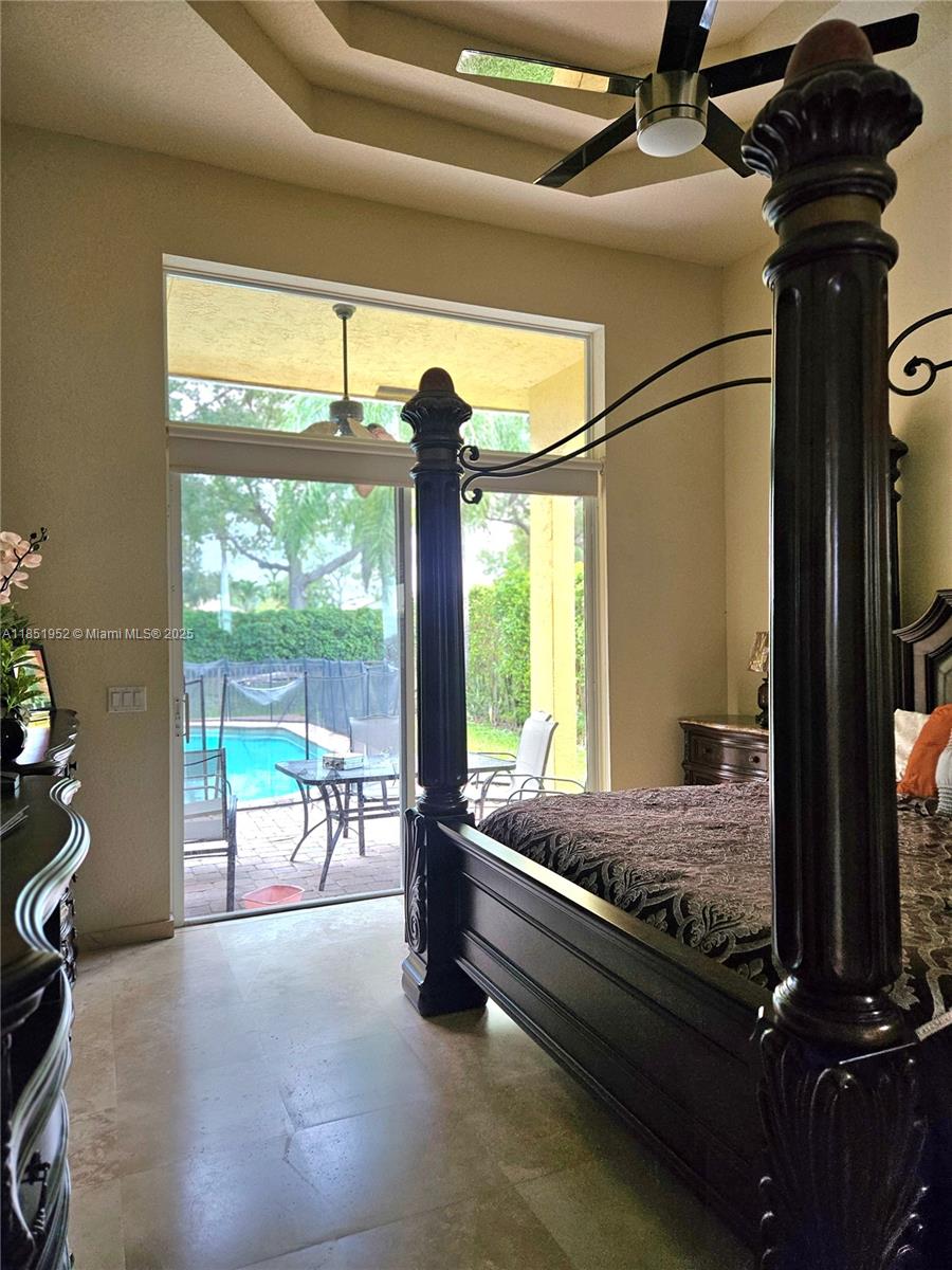 18951 Southwest 30th Street Miramar, FL 33029 - Photo 12 of 62 a room with bed and balcony