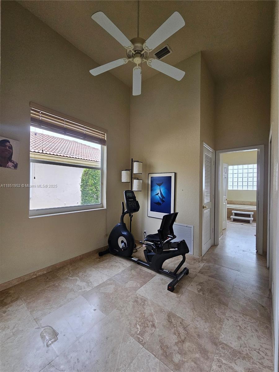 18951 Southwest 30th Street Miramar, FL 33029 - Photo 20 of 62 a view of a workspace with furniture and a window
