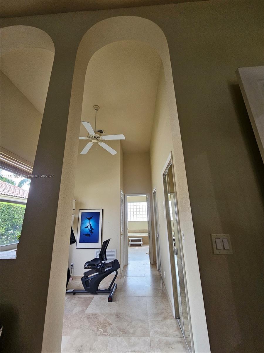 18951 Southwest 30th Street Miramar, FL 33029 - Photo 22 of 62 a living room with furniture and a flat screen tv