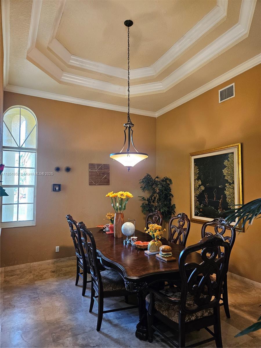 18951 Southwest 30th Street Miramar, FL 33029 - Photo 26 of 62 a view of a dining room with furniture and window