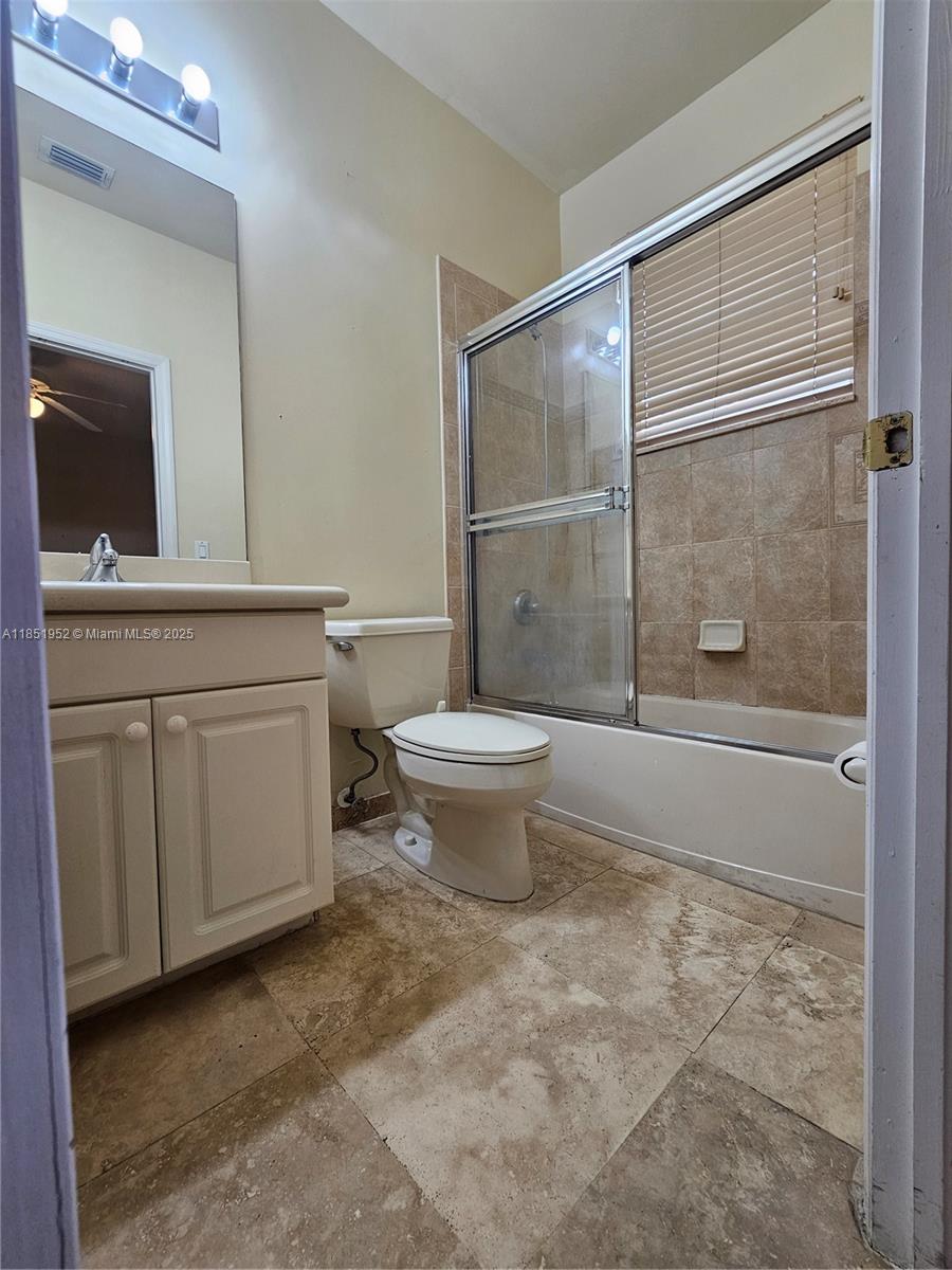 18951 Southwest 30th Street Miramar, FL 33029 - Photo 40 of 62 a bathroom with a sink toilet and shower