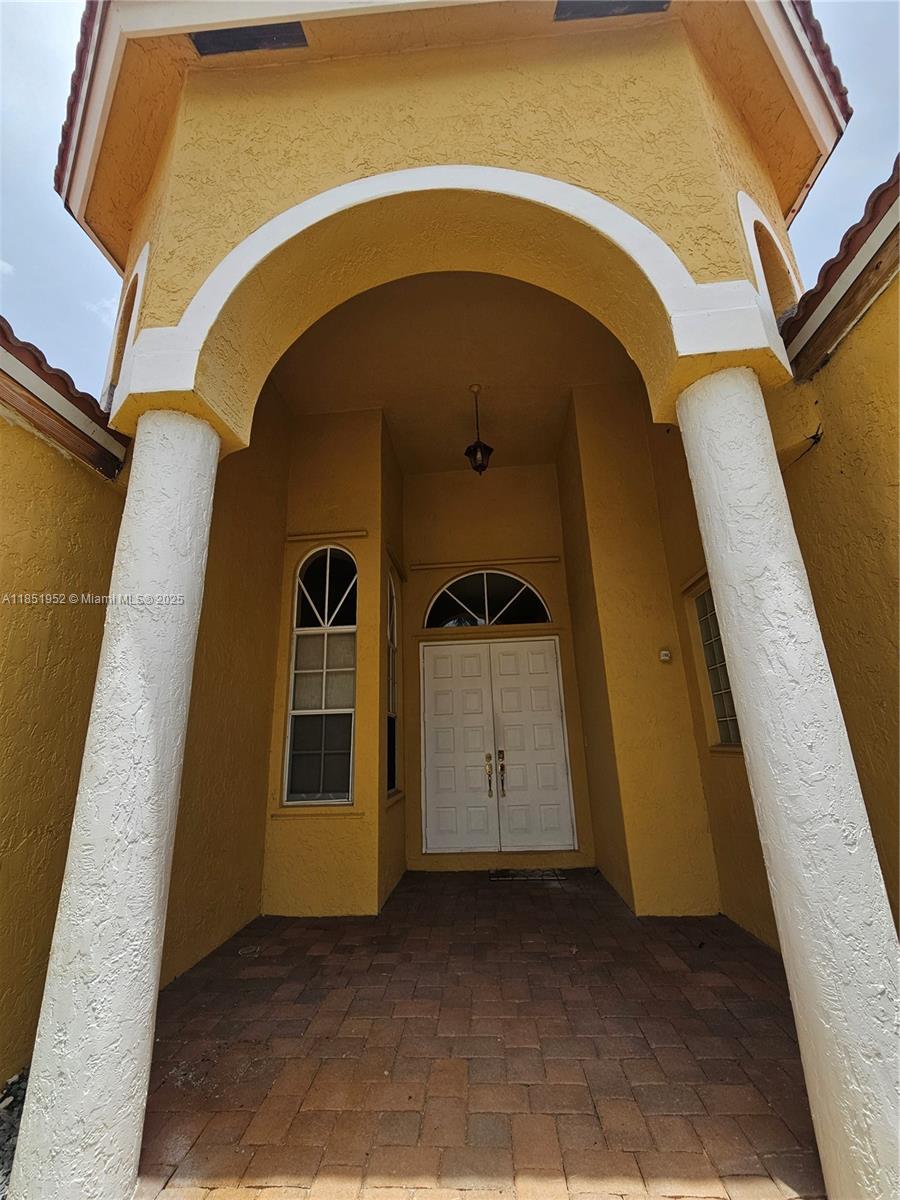 18951 Southwest 30th Street Miramar, FL 33029 - Photo 5 of 62 a front view of a house with windows
