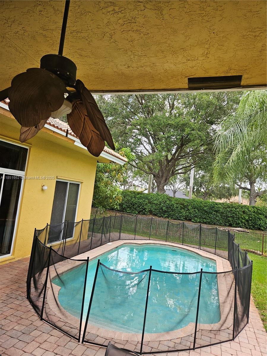 18951 Southwest 30th Street Miramar, FL 33029 - Photo 52 of 62 a view of a tennis court