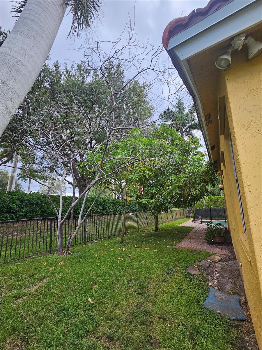 18951 Southwest 30th Street Miramar, FL 33029 - Photo 58 of 62 a view of backyard with green space