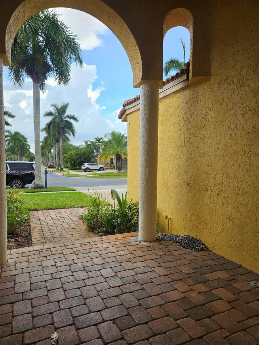 18951 Southwest 30th Street Miramar, FL 33029 - Photo 6 of 62 a view of a swimming pool with a yard