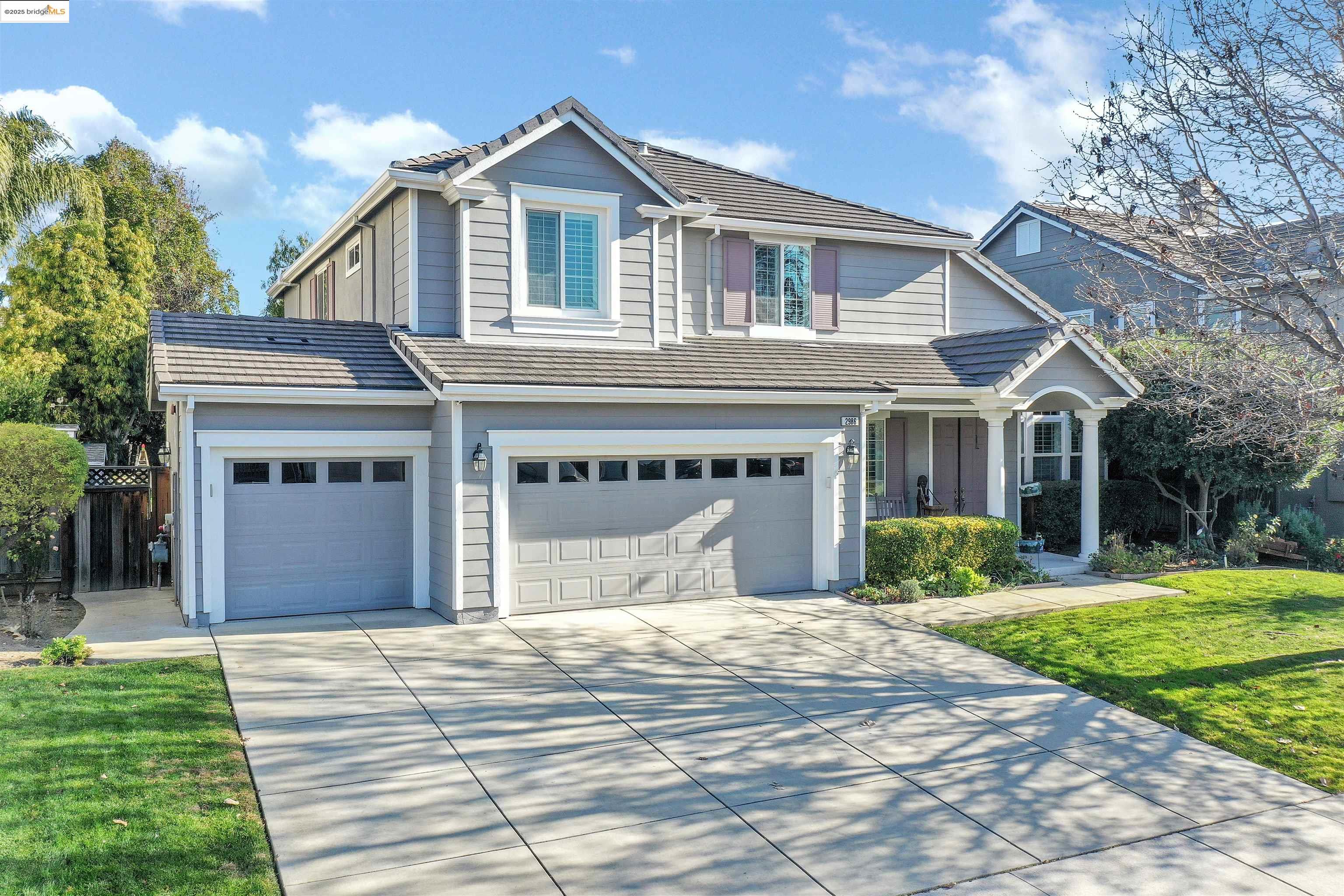2986 Eclipse Place Brentwood, CA 94513 - Photo 1 of 1 a front view of a house with a yard and garage