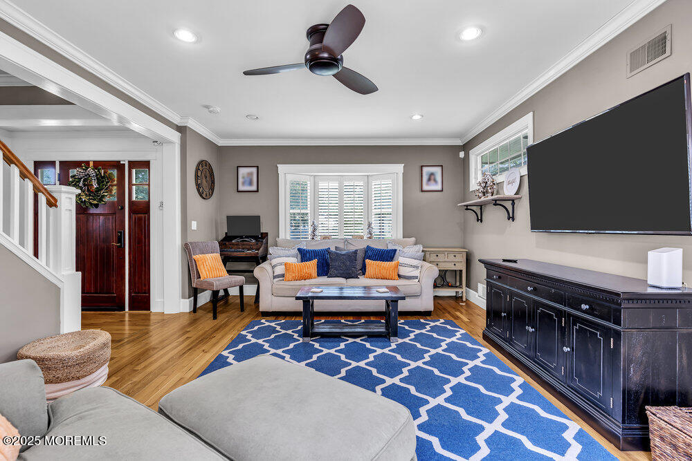 24 Chestnut Street Fair Haven, NJ 07704 - Photo 12 of 42 a living room with furniture and a flat screen tv