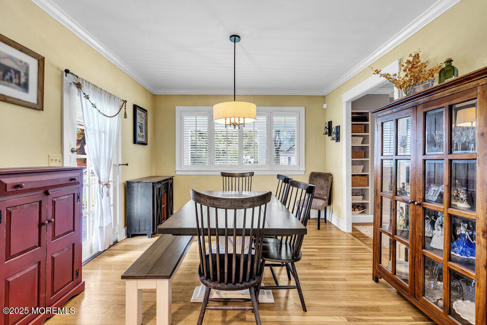 24 Chestnut Street Fair Haven, NJ 07704 - Photo 13 of 42 a view of a dining room with furniture window and wooden floor