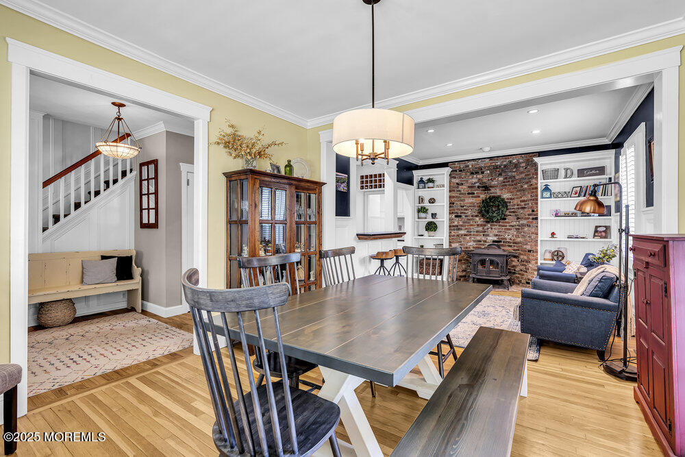 24 Chestnut Street Fair Haven, NJ 07704 - Photo 14 of 42 a view of a dining room with furniture window and wooden floor