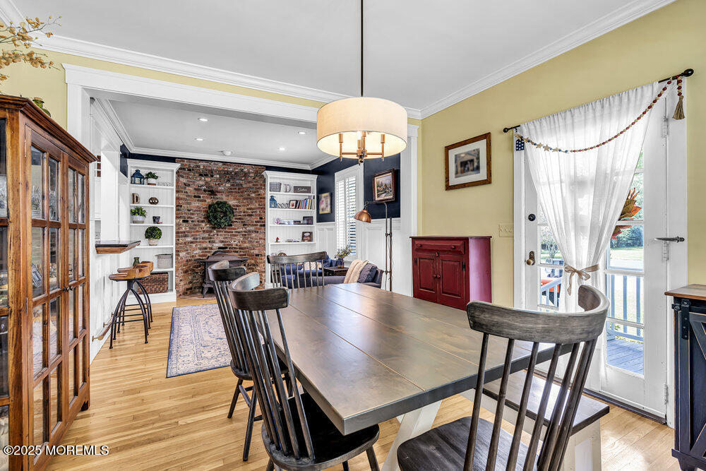 24 Chestnut Street Fair Haven, NJ 07704 - Photo 15 of 42 a view of a dining room with furniture and wooden floor