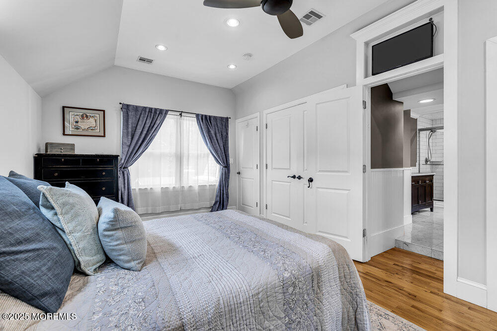 24 Chestnut Street Fair Haven, NJ 07704 - Photo 26 of 42 a bedroom with a bed and a dresser