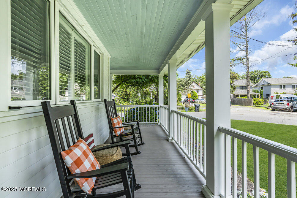 24 Chestnut Street Fair Haven, NJ 07704 - Photo 4 of 42 a view of a two chair in the balcony