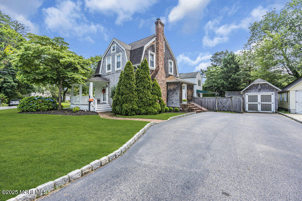 24 Chestnut Street Fair Haven, NJ 07704 - Photo 6 of 42 a front view of house with yard and green space